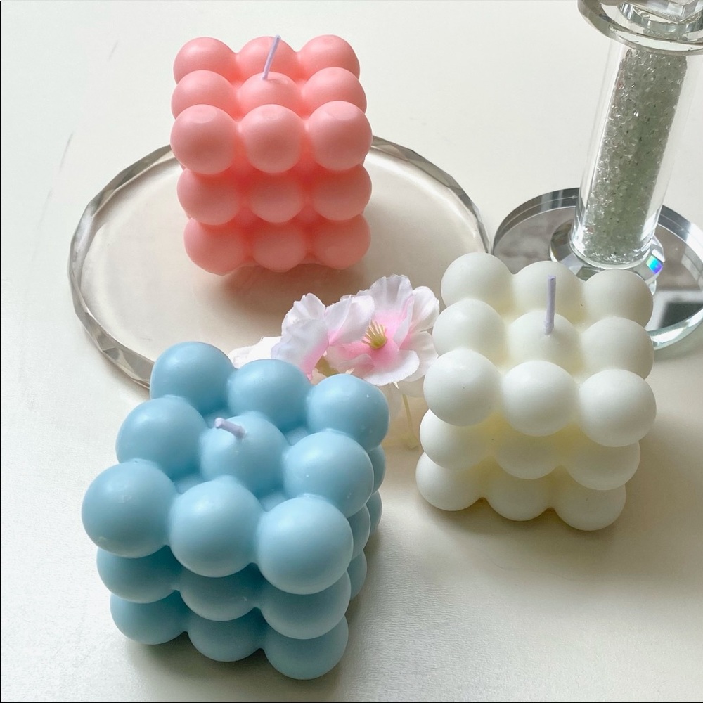 set of 3 bubble cube candles in pink, white, blue